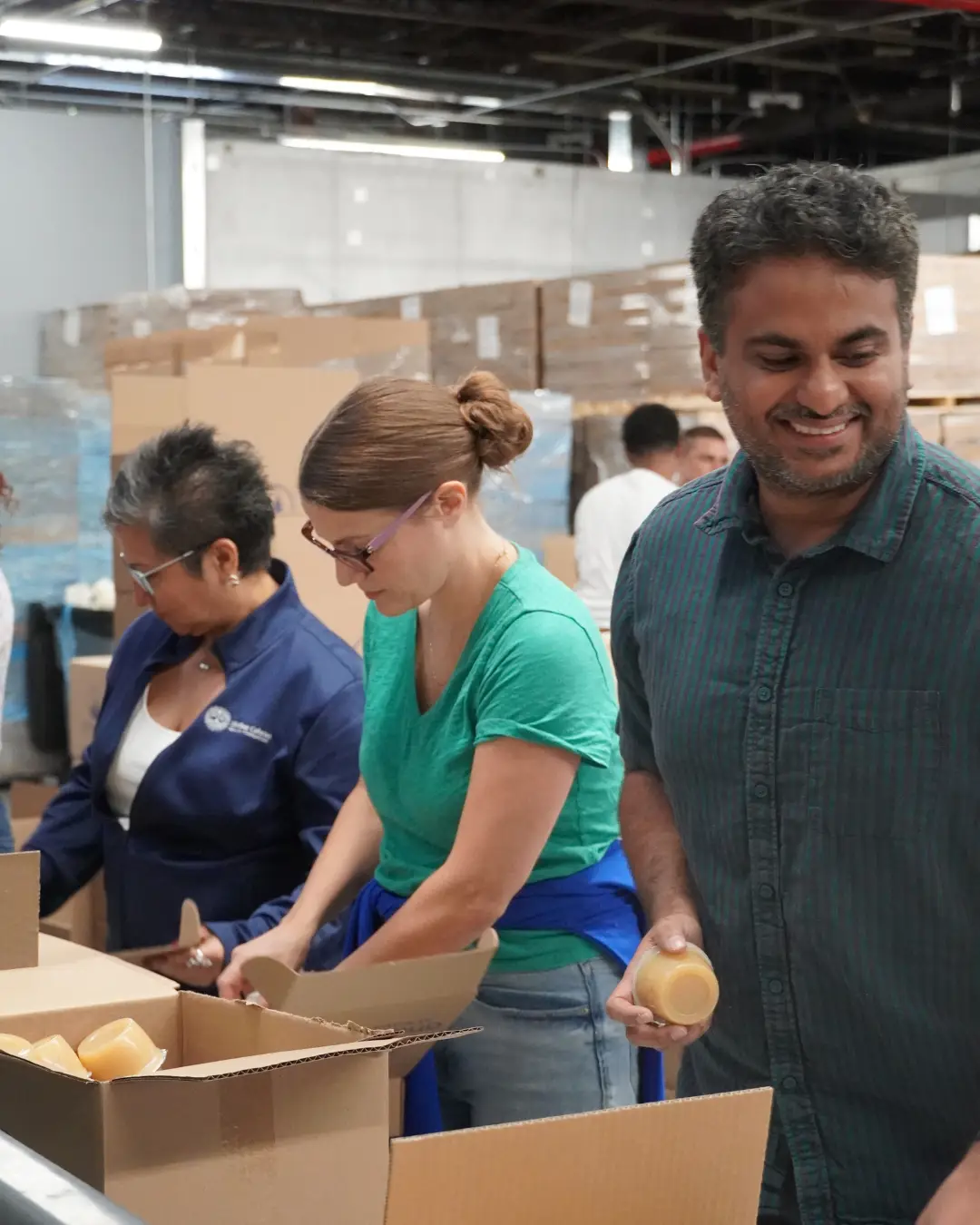CORE VALUES IN ACTION – Our staff spent Volunteer Day packing more than 5,000 emergency food boxes at City Meals’ Bronx warehouse for delivery to food-insecure older adults across NYC’s five boroughs.